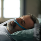 Man sleeping with the Fisher Paykel Nova Micro mask