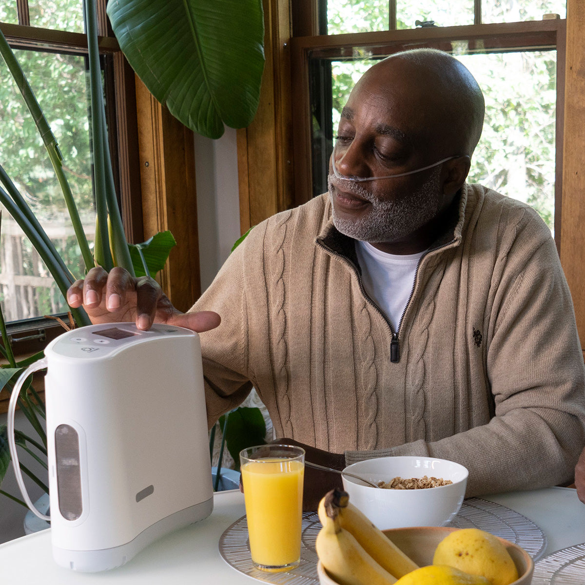 Man using the Oxlife Liberty 2 Portable Oxygen Concentrator